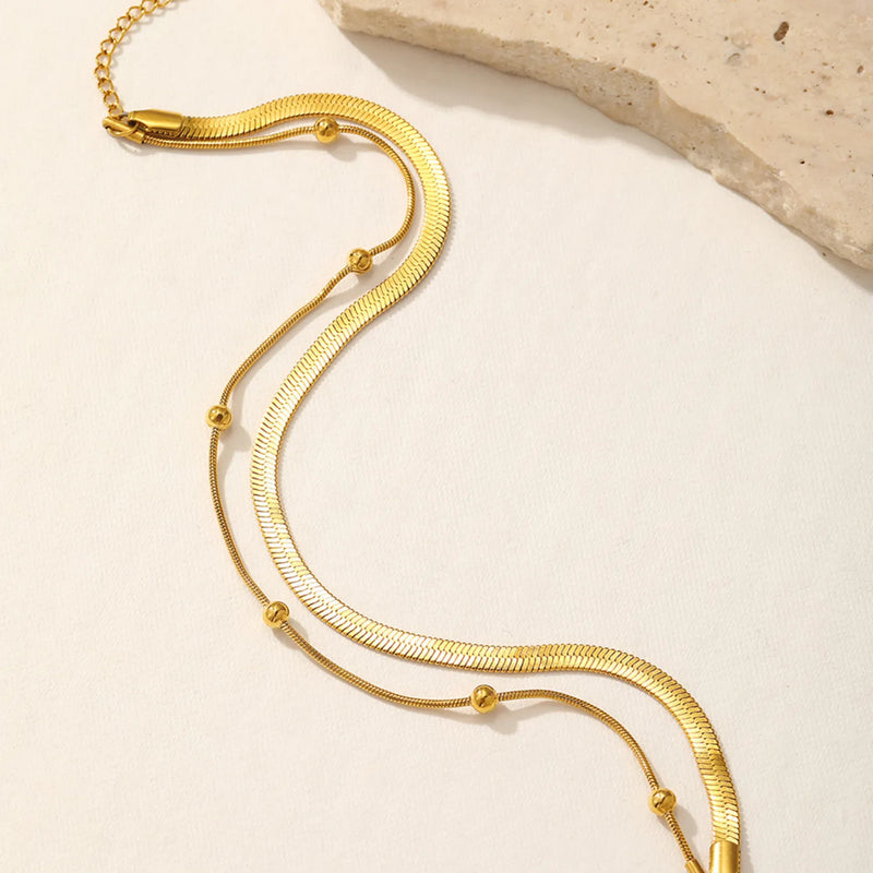 Tornozeleira-Feminina-Minimalista-em-Aço-Inoxidável-dourado-aberto